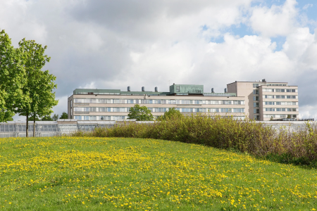 building with green - space surrounding it