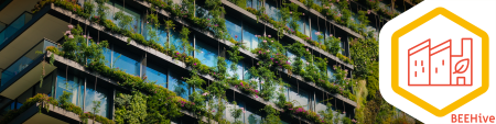green cities banner - building with windows and green wall (made of plants)