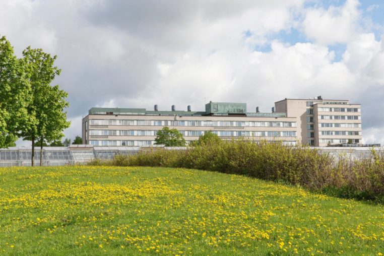 building with green - space surrounding it